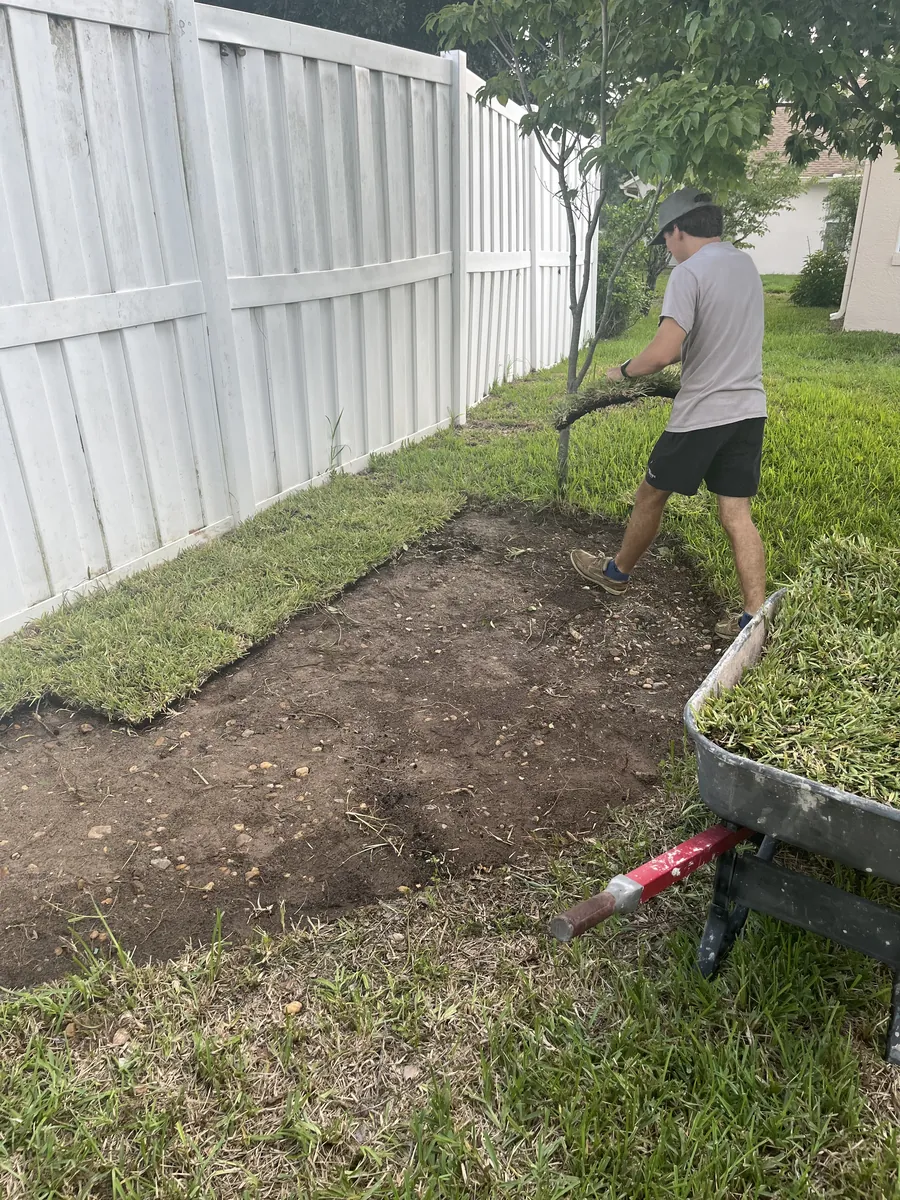 Ton's Ag installing fresh sod on a Floral City property