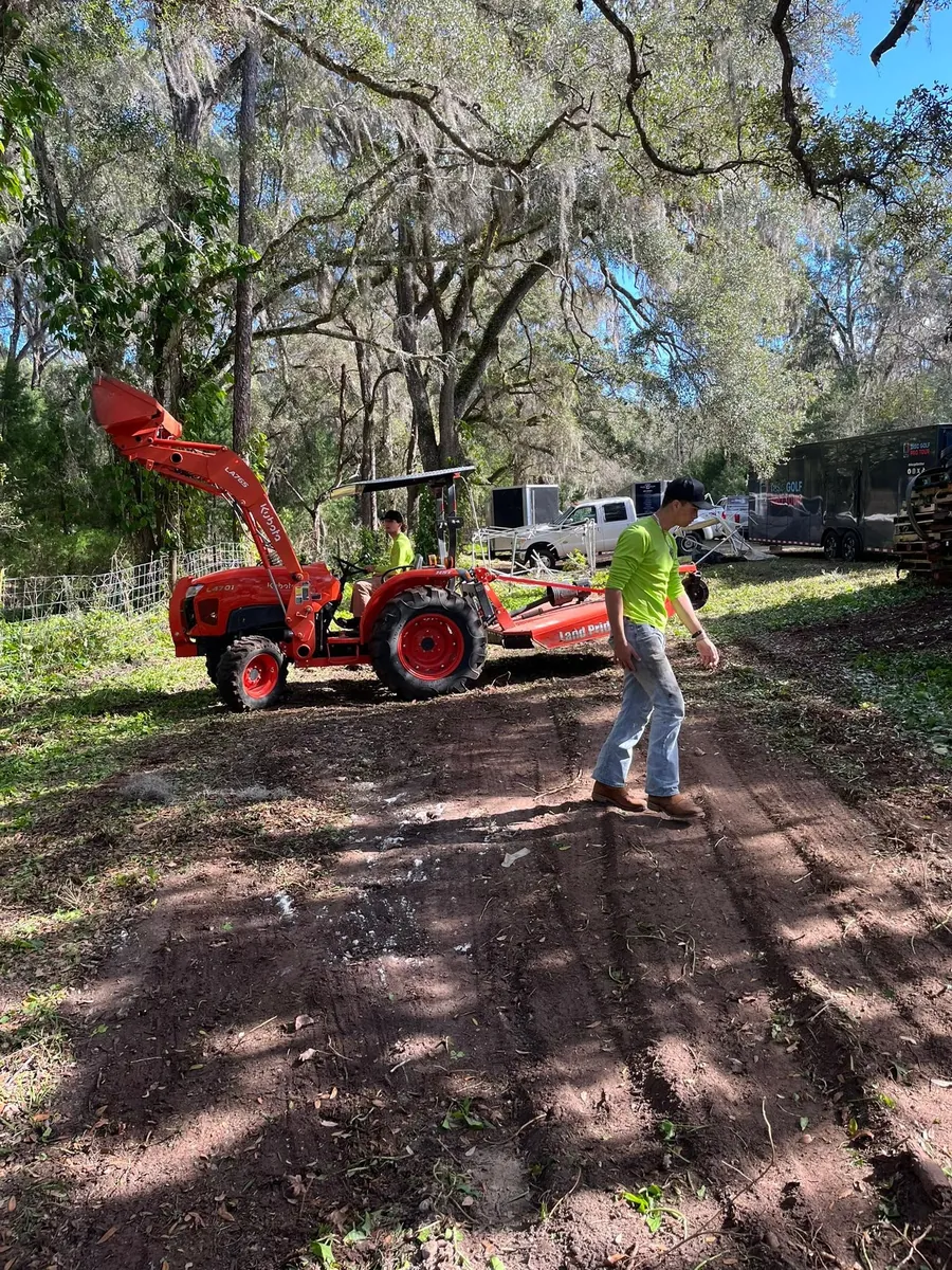 Kubota tractor clearing a Floral City parcel